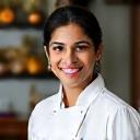 Portrait of Chef Anya Sharma, a culinary wellness expert.